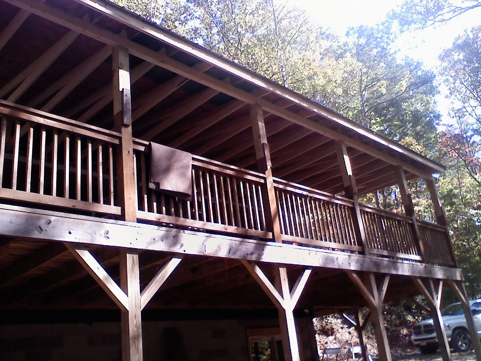 Timber framing under a new elevated porch and deck — Roof Leak Repair in Summerdale by Roofing Brothers